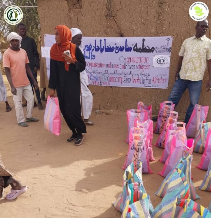 توزيع سلال رمضان غذائية للنازحين من الفاشر في معسكر كلمة بنيالا
